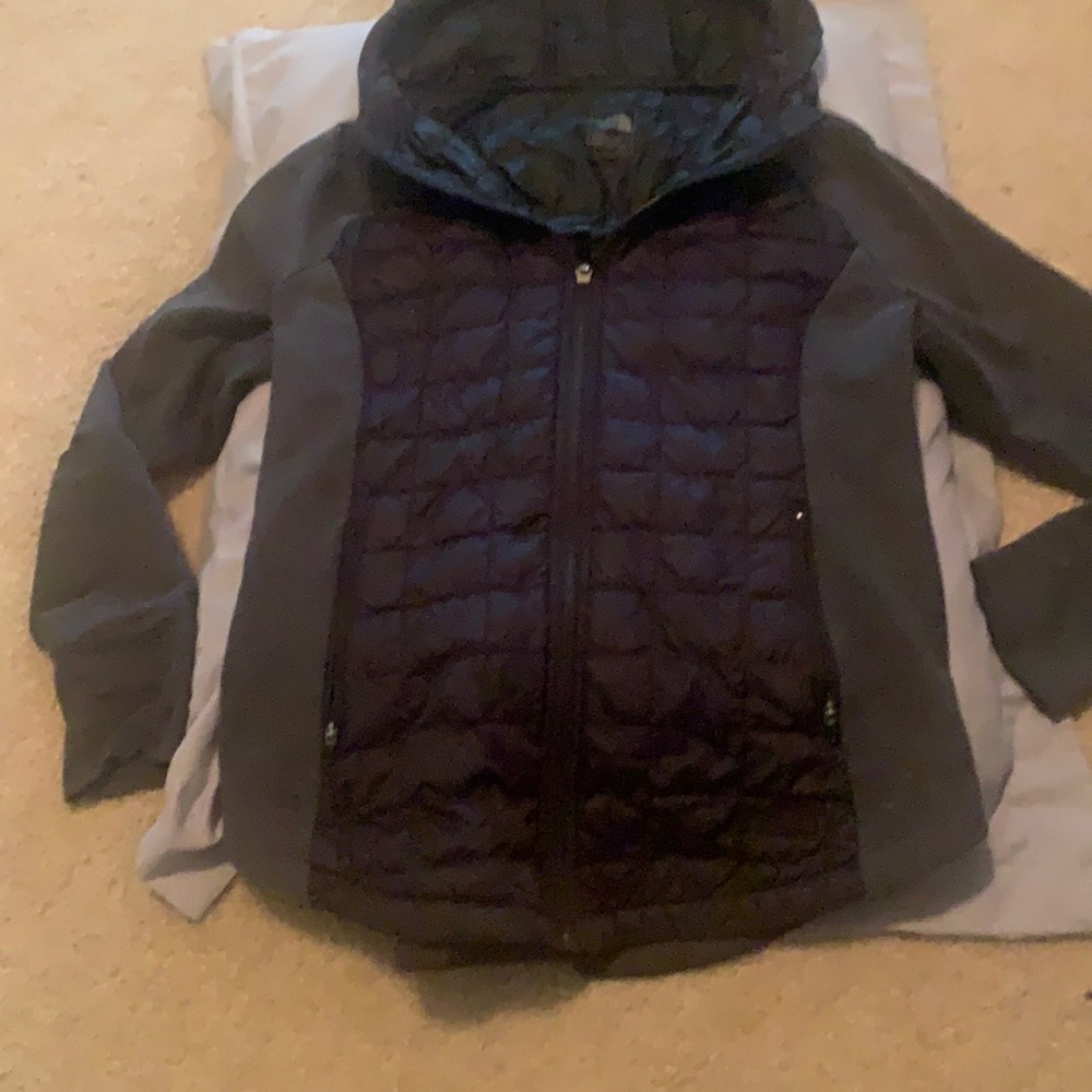Cute North Face light Jacket with good.  Cinching in back.